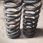 Front spring absorber